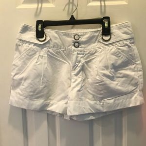 White Elle shorts, button detail